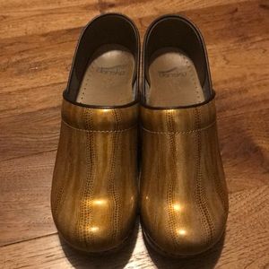 Dansko Shimmering Gold Clogs